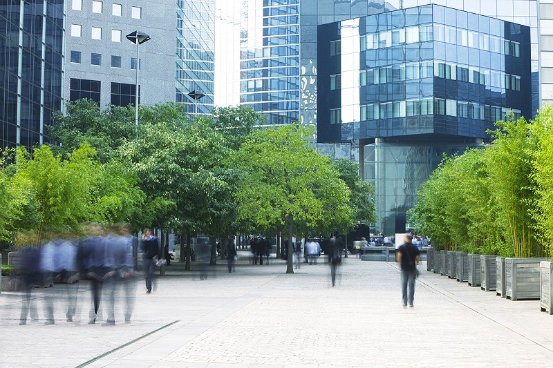 Busy office complex with green space